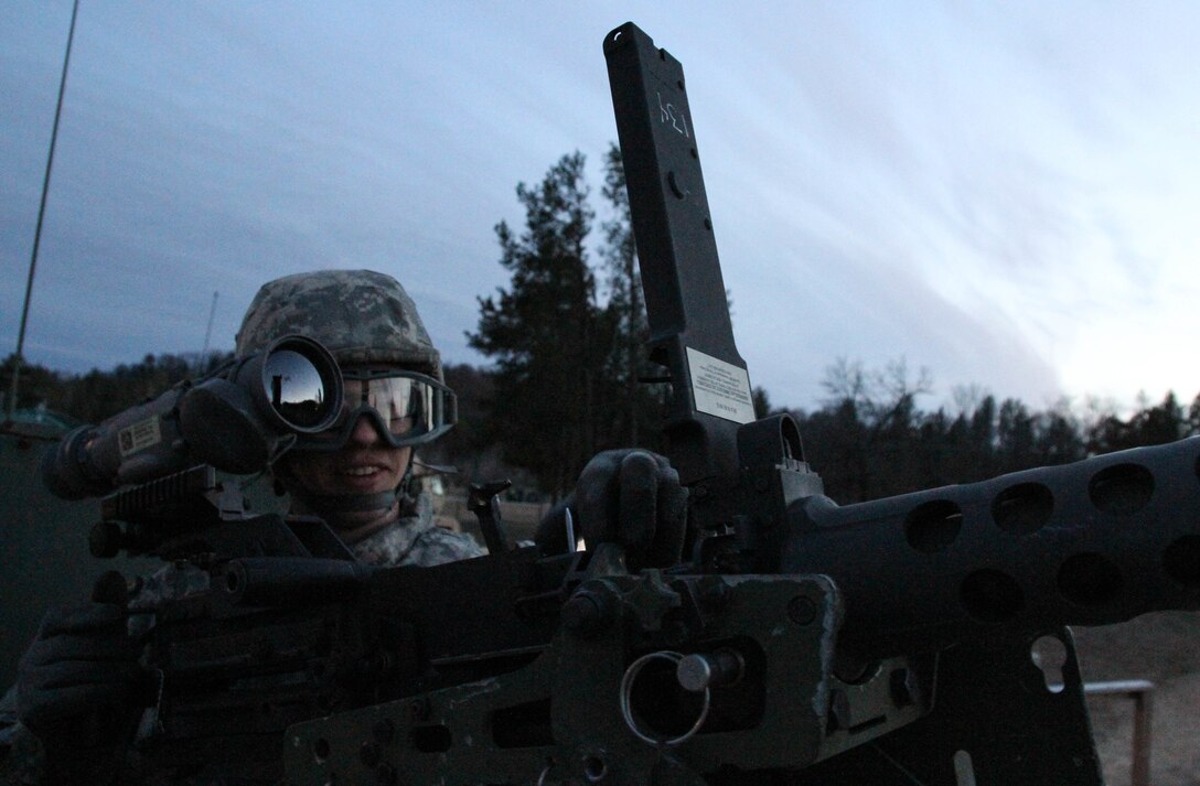 U.S. Army Reserve Spc. Zachary Albrant, Headquarters and Headquarters Company, 406th Combat Sustainment Support Battalion, U.S. Army Reserve Aviation Command, checks head-space and timing on his weapon in preparation for night live-fire qualification during Operation Cold Steel at Fort McCoy, Wis., March 20, 2017. Operation Cold Steel is the U.S. Army Reserve's crew-served weapons qualification and validation exercise to ensure that America's Army Reserve units and Soldiers are trained and ready to deploy on short-notice and bring combat-ready and lethal firepower in support of the Army and our joint partners anywhere in the world. (U.S. Army Reserve photo by Staff Sgt. Debralee Best, 84th Training Command)