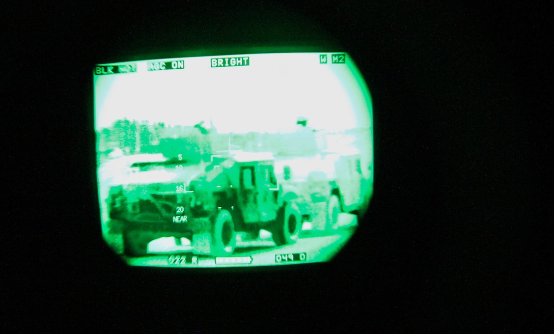 U.S. Army Reserve Soldiers with the 377th Theater Sustainment Command and 79th Sustainment Support Command, are viewed through a thermal weapon sight while waiting to complete mounted qualification night fire during Operation Cold Steel at Fort McCoy, Wis., March 20, 2017. Operation Cold Steel is the U.S. Army Reserve's crew-served weapons qualification and validation exercise to ensure that America's Army Reserve units and Soldiers are trained and ready to deploy on short-notice and bring combat-ready and lethal firepower in support of the Army and our joint partners anywhere in the world. (U.S. Army Reserve photo by Staff Sgt. Debralee Best, 84th Training Command)