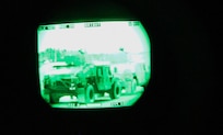 U.S. Army Reserve Soldiers with the 377th Theater Sustainment Command and 79th Sustainment Support Command, are viewed through a thermal weapon sight while waiting to complete mounted qualification night fire during Operation Cold Steel at Fort McCoy, Wis., March 20, 2017. Operation Cold Steel is the U.S. Army Reserve's crew-served weapons qualification and validation exercise to ensure that America's Army Reserve units and Soldiers are trained and ready to deploy on short-notice and bring combat-ready and lethal firepower in support of the Army and our joint partners anywhere in the world. (U.S. Army Reserve photo by Staff Sgt. Debralee Best, 84th Training Command)