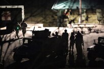 Army Reserve vehicle gunnery crews execute night live-fire qualifications

Gunnery crews take a few minutes outside their vehicles before a night live-fire gunnery qualification during the Operation Cold Steel exercise conducted at Fort McCoy, Wisconsin, Mar. 20, 2017. Operation Cold Steel is the U.S. Army Reserve’s first large-scale live-fire training and crew-served weapons qualification and validation exercise. Cold Steel plays a critical role in ensuring that America’s Army Reserve units and Soldiers are trained and ready to deploy on short-notice and bring combat-ready and lethal firepower in support of the Total Army and Joint Force partners anywhere in the world. In support of the Total Army Force, First Army Master Gunners participated in Cold Steel to provide expertise in crew level gunnery qualifications, and to develop Vehicle Crew Evaluator training, preparing units here and when they return to their home stations to conduct crew served weapons training and vehicle crew gunnery at the unit-level. 475 crews with an estimated 1,600 Army Reserve Soldiers will certify in M2, M19 and M240 Bravo gunner platforms across 12-day rotations through the seven-week exercise. 
(U.S. Army Reserve photo by Master Sgt. Anthony L. Taylor)