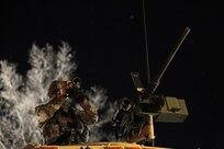 Pvt. Sean Bourque, Petroleum Supply Specialist assigned to the 786th Quartermaster Company, Provo, Utah, views the firing range through a thermal weapon sight ahead of a night live-fire gunnery qualification during the Operation Cold Steel exercise conducted at Fort McCoy, Wisconsin, Mar. 20, 2017. Operation Cold Steel is the U.S. Army Reserve’s first large-scale live-fire training and crew-served weapons qualification and validation exercise. Cold Steel plays a critical role in ensuring that America’s Army Reserve units and Soldiers are trained and ready to deploy on short-notice and bring combat-ready and lethal firepower in support of the Total Army and Joint Force partners anywhere in the world. In support of the Total Army Force, First Army Master Gunners participated in Cold Steel to provide expertise in crew level gunnery qualifications, and to develop Vehicle Crew Evaluator training, preparing units here and when they return to their home stations to conduct crew served weapons training and vehicle crew gunnery at the unit-level. 475 crews with an estimated 1,600 Army Reserve Soldiers will certify in M2, M19 and M240 Bravo gunner platforms across 12-day rotations through the seven-week exercise. 
(U.S. Army Reserve photo by Master Sgt. Anthony L. Taylor)