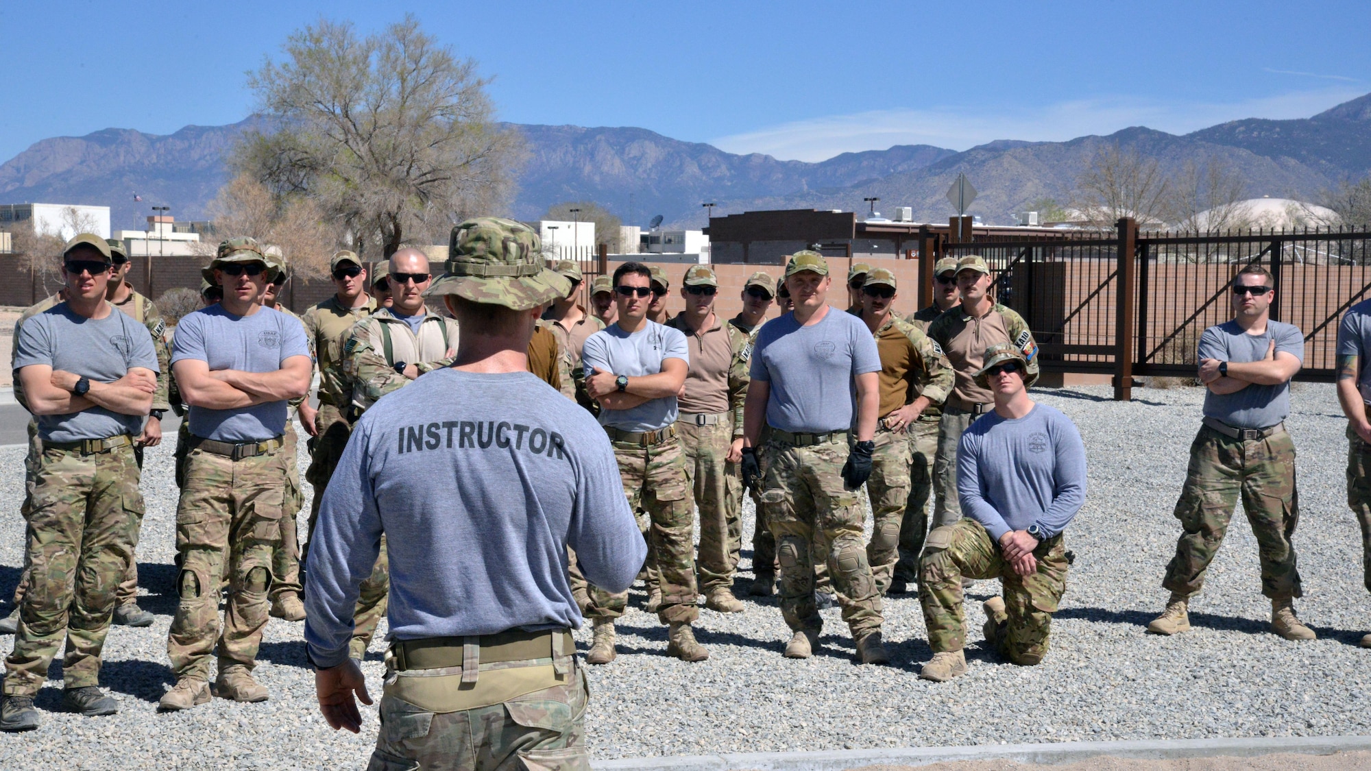 Major Brian Carey, 351st Battlefield Airman Training Squadron's director of operations, delivers a safety brief to assault course participants March 16 at Kirtland Air Force Base. Carey provided safety briefs for all obstacles, including some demonstrations. The course includes challenges like low crawls, rope and rock climbing, and jumping over a high wall, and will be used in training BATS students. (U.S. Air Force Photo/Senior Airman Chandler Baker)