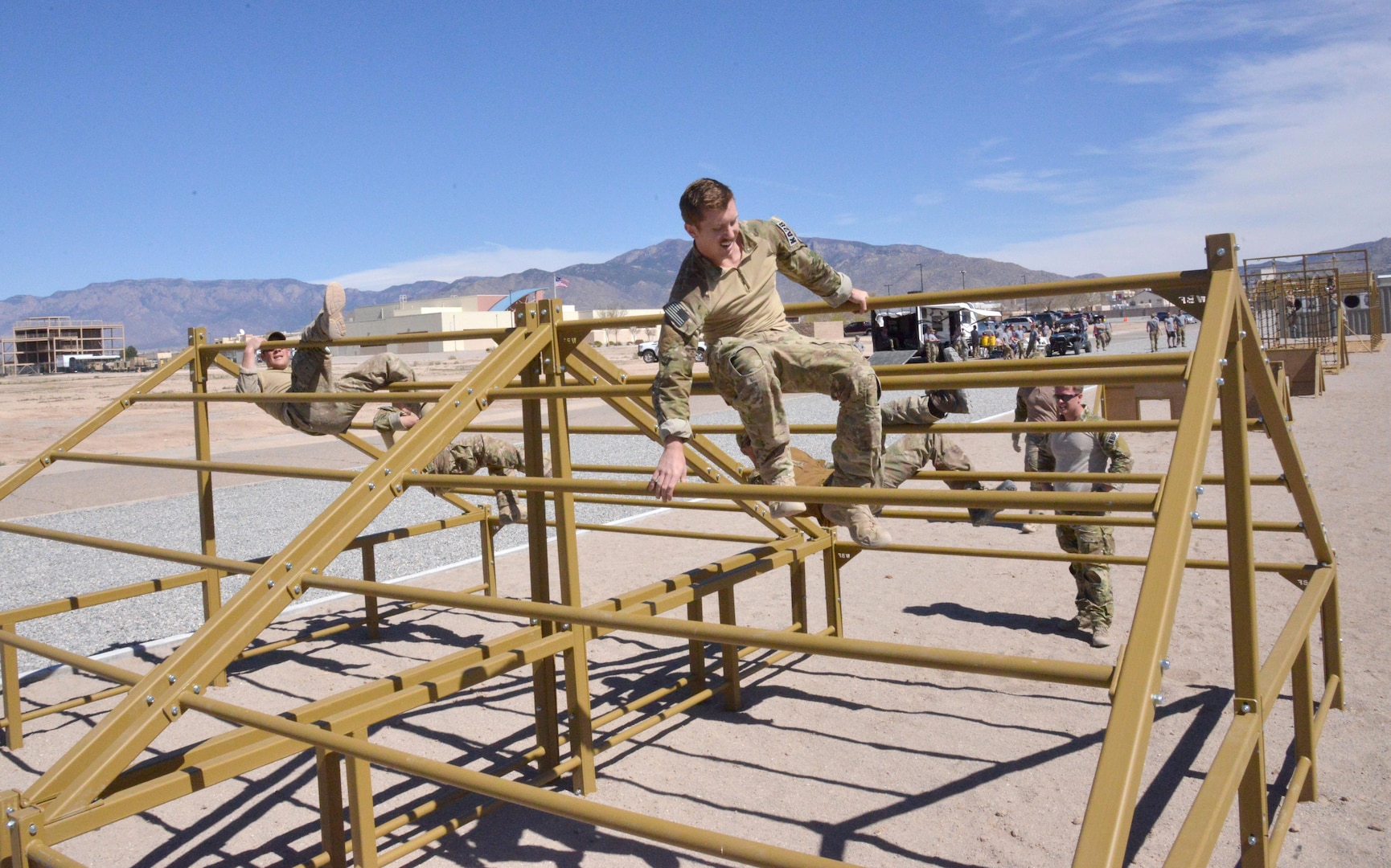 Pararescue trainees from the 351st Battlefield Airmen Training Squadron test the unit's new assault course March 17 at Kirtland. The course includes challenges like low crawls, rope and rock climbing, and jumping over a high wall, and will be used in training BATS students. (U.S. Air Force Photo/Senior Airman Chandler Baker)