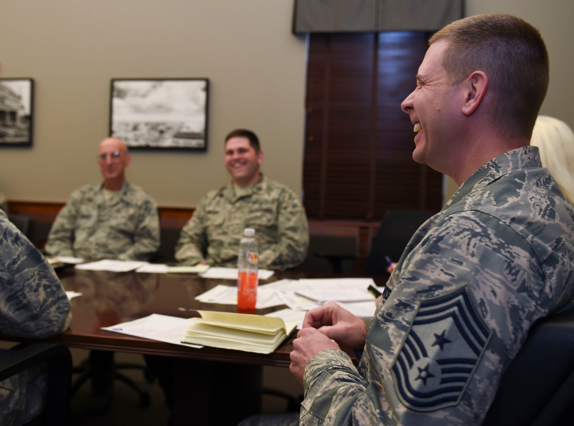 U.S. Air Force Chief Master Sgt. Kennon Arnold, 633rd Air Base Wing command chief, addresses community concerns voiced by helping agency representatives during a Community Action Information Board meeting at Joint Base Langley-Eustis, Va., March 9, 2017. The Integrated Delivery System council meets monthly to collaborate and coordinate plans to enrich life for Airmen and their families. (U.S. Air Force photo/Staff Sgt. Natasha Stannard)