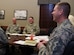 U.S. Air Force Chief Master Sgt. Kennon Arnold, 633rd Air Base Wing command chief, addresses community concerns voiced by helping agency representatives during a Community Action Information Board meeting at Joint Base Langley-Eustis, Va., March 9, 2017. The Integrated Delivery System council meets monthly to collaborate and coordinate plans to enrich life for Airmen and their families. (U.S. Air Force photo/Staff Sgt. Natasha Stannard)