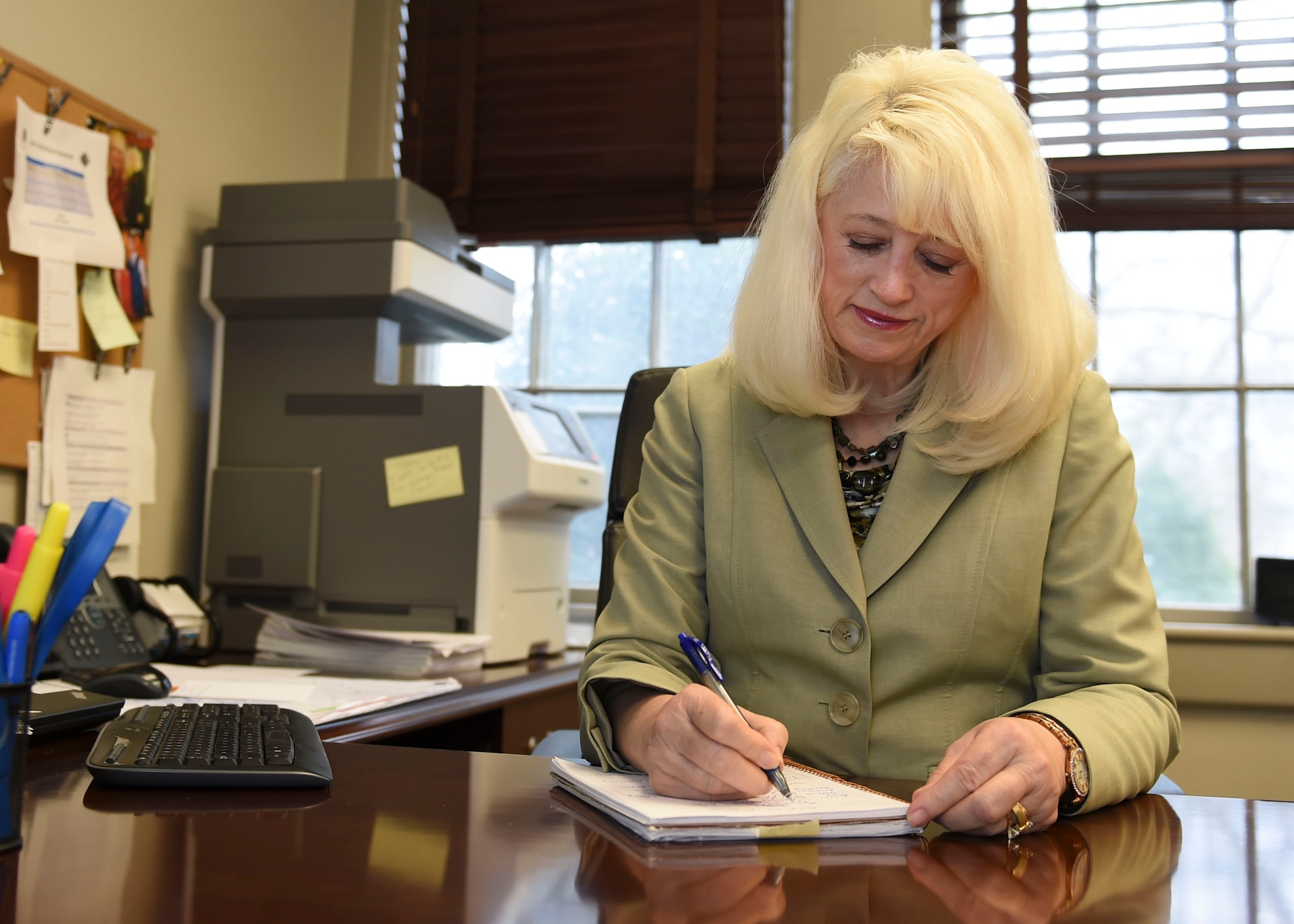 Carole Barton, Community Support coordinator, works at her desk at Joint Base Langley-Eustis, Va., March 21, 2017. Barton leads the Integrated Delivery System, which is a network of helping agencies that work together to make improvements for the installation, which can potentially reach U.S. Air Force headquarters. (U.S. Air Force photo/Staff Sgt. Natasha Stannard)