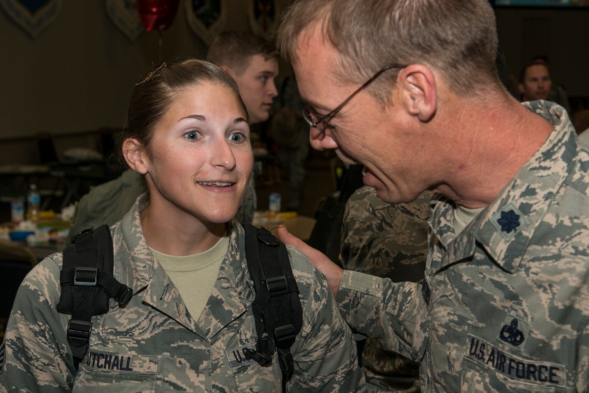 U.S. Air Force Staff Sgt. Amber Cutchall is welcomed home by Lt. Col. Warren Crabtree, 707th Maintenance Squadron (MXS) commander, after returning home from a six-month deployment on Mar. 20, 2017, Barksdale Air Force Base, La.  Cutchall is assigned to the Air Force Reserve Command’s 707th MXS and deployed to Southwest Asia in support of Operations Inherent Resolve and Freedom’s Sentinel. (U.S. Air Force photo by Master Sgt. Greg Steele/released)