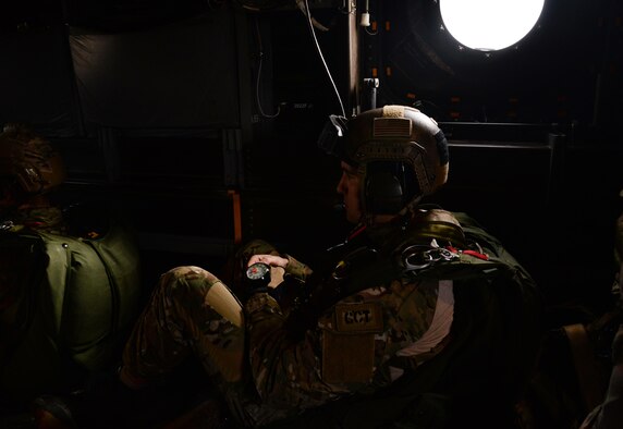 A U.S. Air Force Air Commando, assigned to the 321st Special Tactics Squadron anticipates a military free fall from a CV-22 Osprey March 17, 2017, over RAF Mildenhall, England. The exercise also included Air Commandos performing free falls from an MC-130J Commando II and allows flight crew and 321st STS members to practice safely deploying from aircraft to reach designated drop zones. (U.S. Air Force photo by Senior Airman Justine Rho)