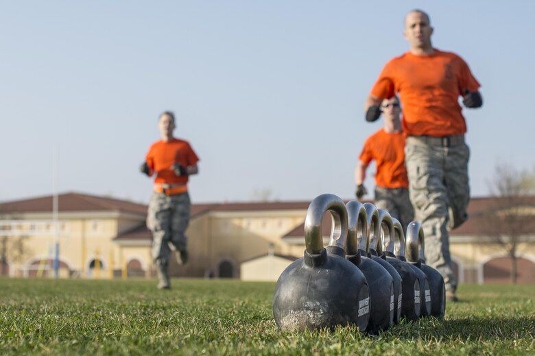 A group of 31st Munitions Squadron Airmen participate in the first Combat Warrior Challenge at Aviano Air Base, March 16, 2017. The teams competed head-to-head, through a series of obstacles that tested physical strength and mental toughness. (U.S. Air Force photo by Senior Airman Cory W. Bush)