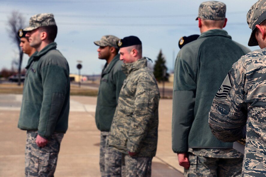 Airmen from the Malmstrom Airman Leadership School perform drill evaulations March 14, 2017, at Malmstrom Air Force Base, Mont. Drill evaluations are a part of the ALS cirriculum and are designed to honor military tradition and teach students leadership and followership traits. (U.S. Air Force photo/Senior Airman Magen M. Reeves)