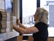 Sharon McCrea, Malmstrom Air Force Base postmaster, restocks boxes at the base contract postal unit March 21, 2017, at Malmstrom Air Force Base, Mont. McCrea assists about 75 customers with mailing off packages, changing their addresses, issuing mailbox keys and many other things daily. (U.S. Air Force photo/Senior Airman Jaeda Tookes)