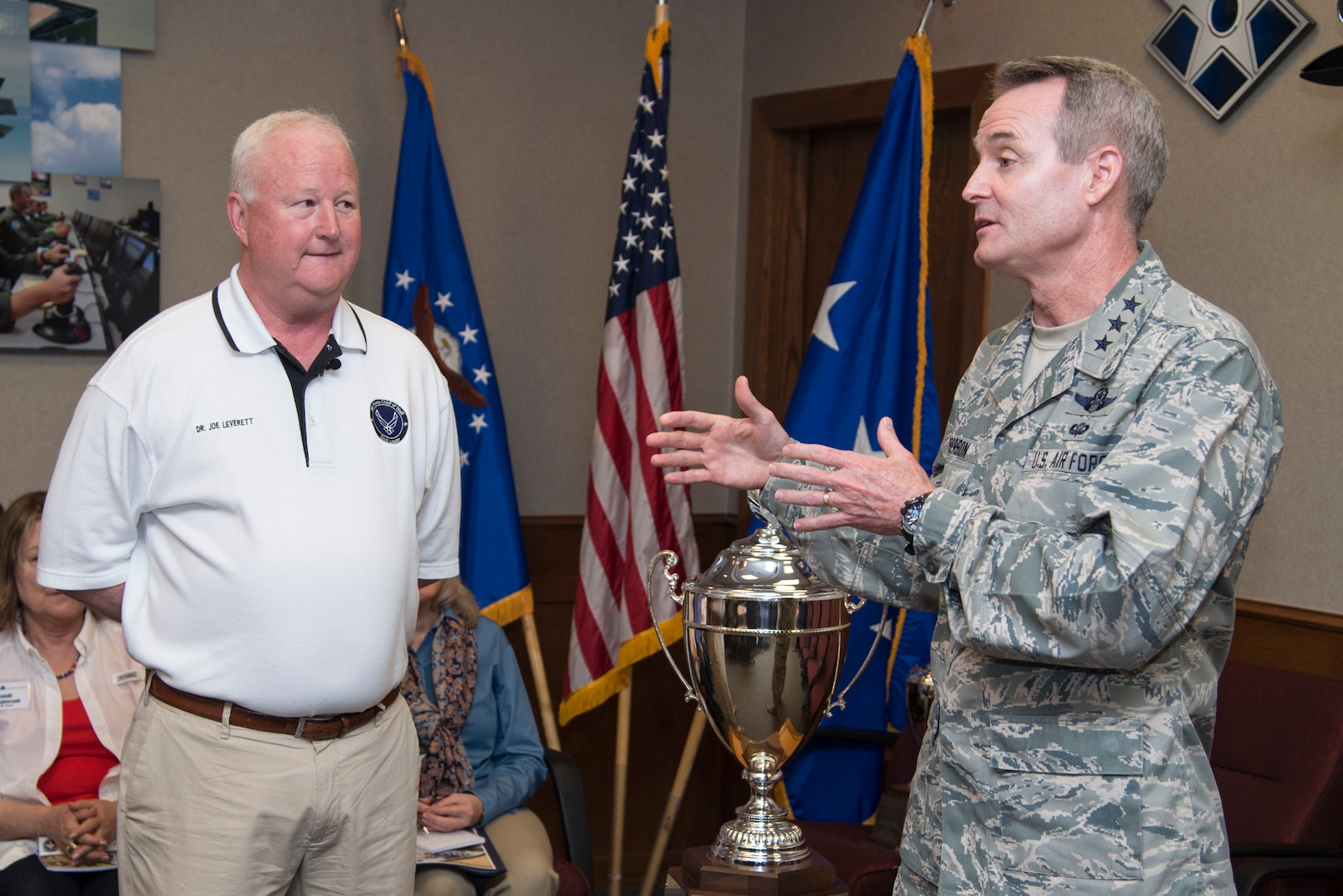 Lt. Gen. Darryl Roberson, commander of Air Education and Training Command, and Dr. Joe Leverett , provided background information on the significance of the Altus Trophy during the AETC Commander’s Civic Leader Group tour March 22, 2017, at Joint Base San Antonio-Randolph, Texas.  The trophy is presented annually to the community judged to have provided the top support to an AETC base. (U.S. Air Force photo by Sean Worrell)