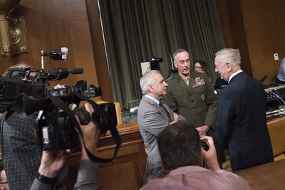 Defense Secretary Jim Mattis and Marine Corps Gen. Joe Dunford, chairman of the Joint Chiefs of Staff, speak with Rhode Island Senator Jack Reed at the Senate Appropriations Defense Subcommittee hearing on Capitol Hill, March 22, 2017. DoD photo by Navy Petty Officer 2nd Class Dominique A. Pineiro