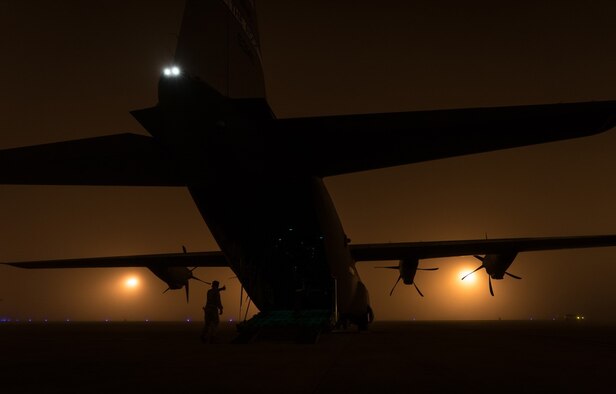 A loadmaster unloads a C-130J Super Hercules aircraft during the Green Flag Little Rock 17-05 exercise March 19 in Alexandria, Louisiana. The 815th Airlift Squadron provided areal support during the exercise by delivering supplies and transporting troops. (U.S. Air Force photo/ Staff Sgt. Shelton Sherrill)