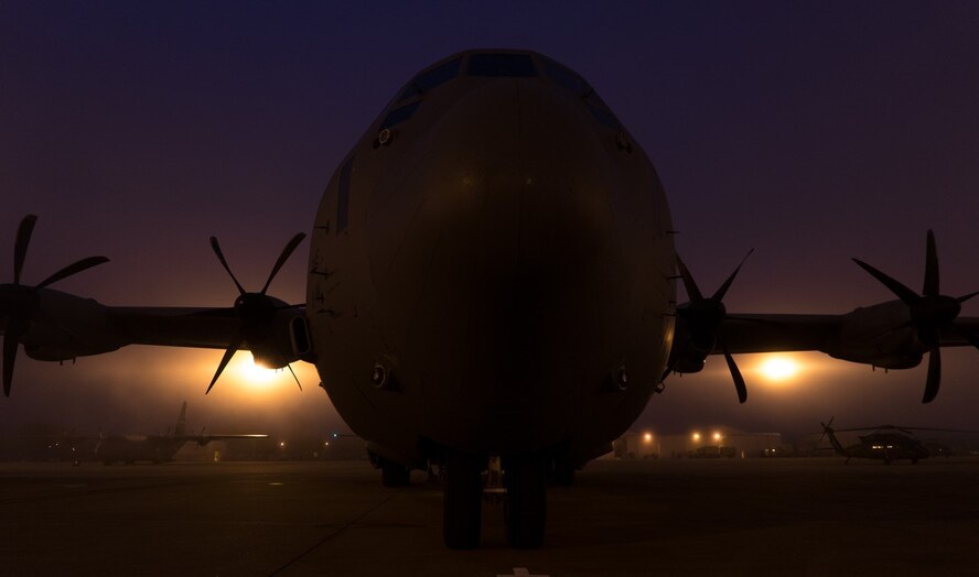 A loadmaster unloads a C-130J Super Hercules aircraft during the Green Flag Little Rock 17-05 exercise March 19 in Alexandria, Louisiana. The 815th Airlift Squadron provided areal support during the exercise by delivering supplies and transporting troops. (U.S. Air Force photo/ Staff Sgt. Shelton Sherrill)