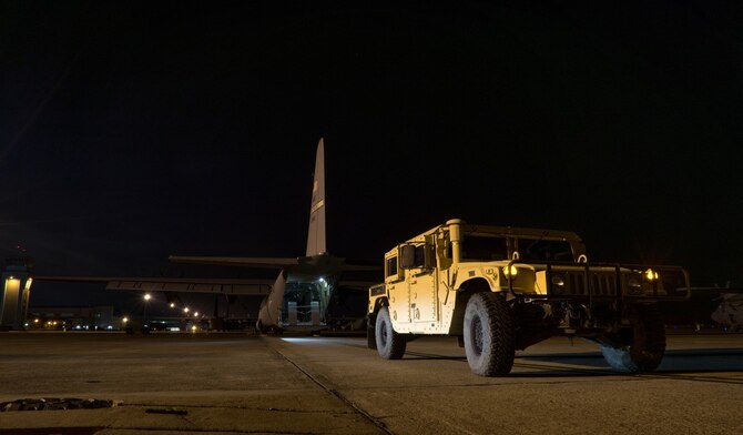 A loadmaster unloads a C-130J Super Hercules aircraft during the Green Flag Little Rock 17-05 exercise March 19 in Alexandria, Louisiana. The 815th Airlift Squadron provided areal support during the exercise by delivering supplies and transporting troops. (U.S. Air Force photo/ Staff Sgt. Shelton Sherrill)