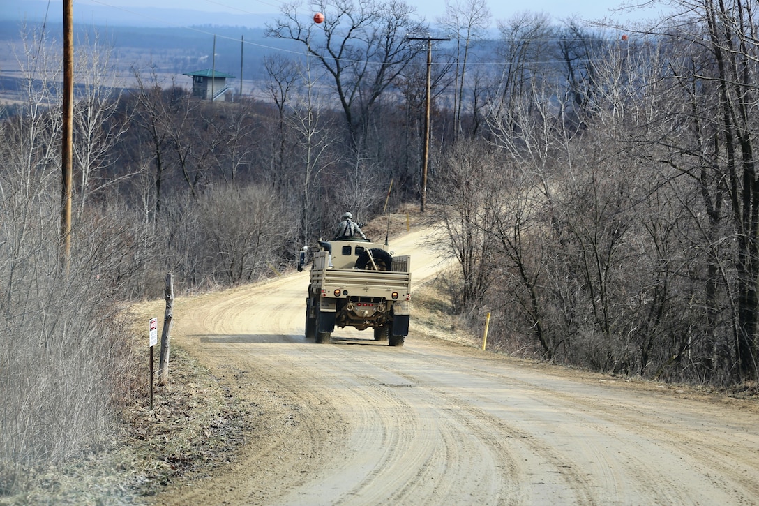 Soldiers at Fort McCoy for the Operation Cold Steel exercise participate in exercise operations March 17, 2017, near Range 4 at Fort McCoy, Wis. Operation Cold Steel’s purpose is to qualify select gun crews to support “Objective-T” requirements for Army Early Response Forces, or AERF. Army Reserve forces, which are part of the overall AERF contingency forces, are part of the Army plan to provide a force that can deploy on short notice to respond to contingencies when needed. (U.S. Army Photo by Scott T. Sturkol, Public Affairs Office, Fort McCoy, Wis.)