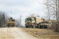 Soldiers at Fort McCoy for the Operation Cold Steel exercise participate in exercise operations March 17, 2017, near Range 4 at Fort McCoy, Wis. Operation Cold Steel’s purpose is to qualify select gun crews to support “Objective-T” requirements for Army Early Response Forces, or AERF. Army Reserve forces, which are part of the overall AERF contingency forces, are part of the Army plan to provide a force that can deploy on short notice to respond to contingencies when needed. (U.S. Army Photo by Scott T. Sturkol, Public Affairs Office, Fort McCoy, Wis.)