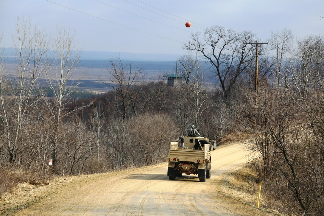 Soldiers at Fort McCoy for the Operation Cold Steel exercise participate in exercise operations March 17, 2017, near Range 4 at Fort McCoy, Wis. Operation Cold Steel’s purpose is to qualify select gun crews to support “Objective-T” requirements for Army Early Response Forces, or AERF. Army Reserve forces, which are part of the overall AERF contingency forces, are part of the Army plan to provide a force that can deploy on short notice to respond to contingencies when needed. (U.S. Army Photo by Scott T. Sturkol, Public Affairs Office, Fort McCoy, Wis.)