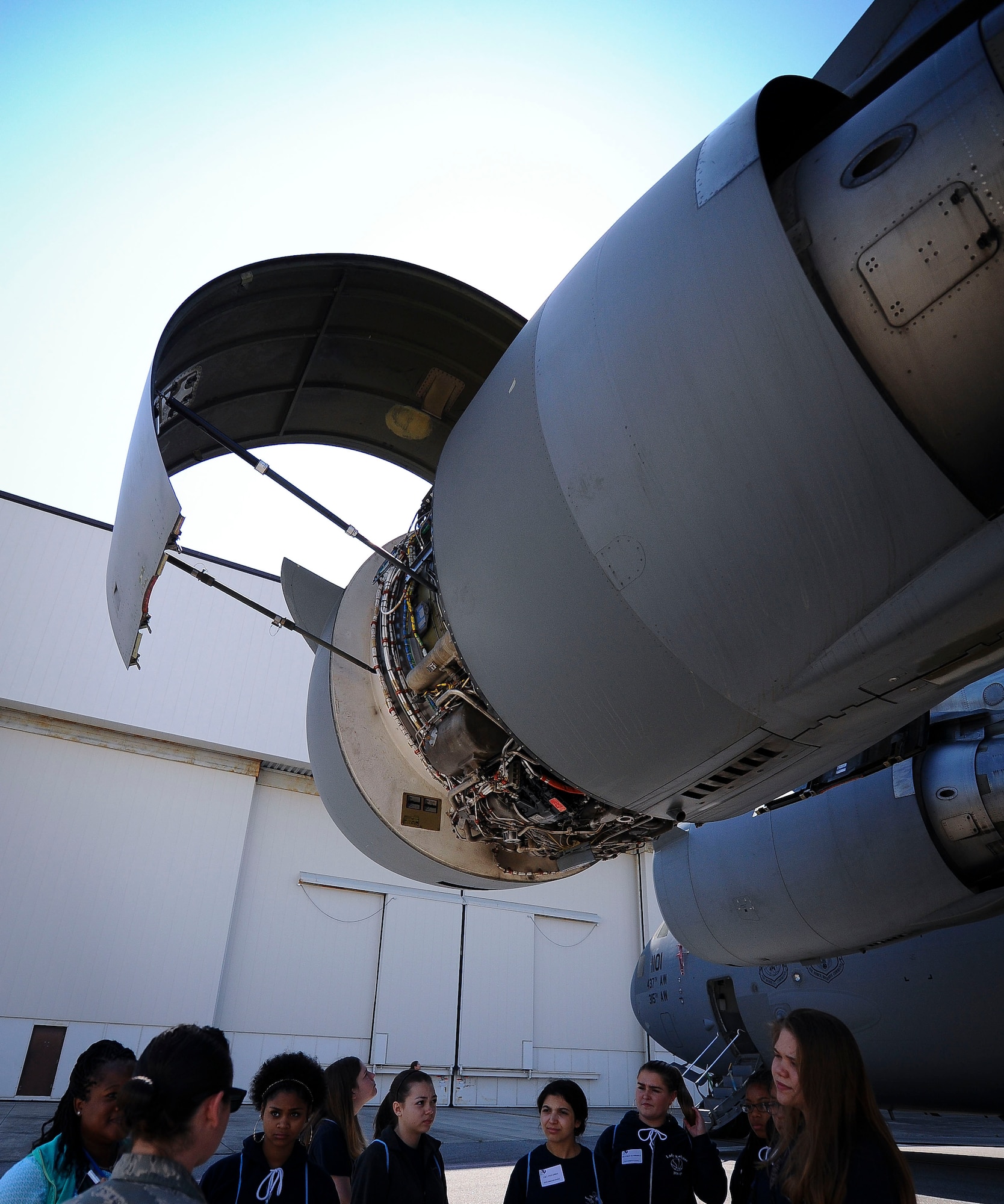 Local school girls attending the 10th Annual Joint Base Charleston Women in Aviation Career Day March 20 at Joint Base Charleston, S.C. speak with C-17 Globemaster III maintainers about their role in the Air Force Reserve.  (U.S. Air Force Photo by Senior Airman Tom Brading)
