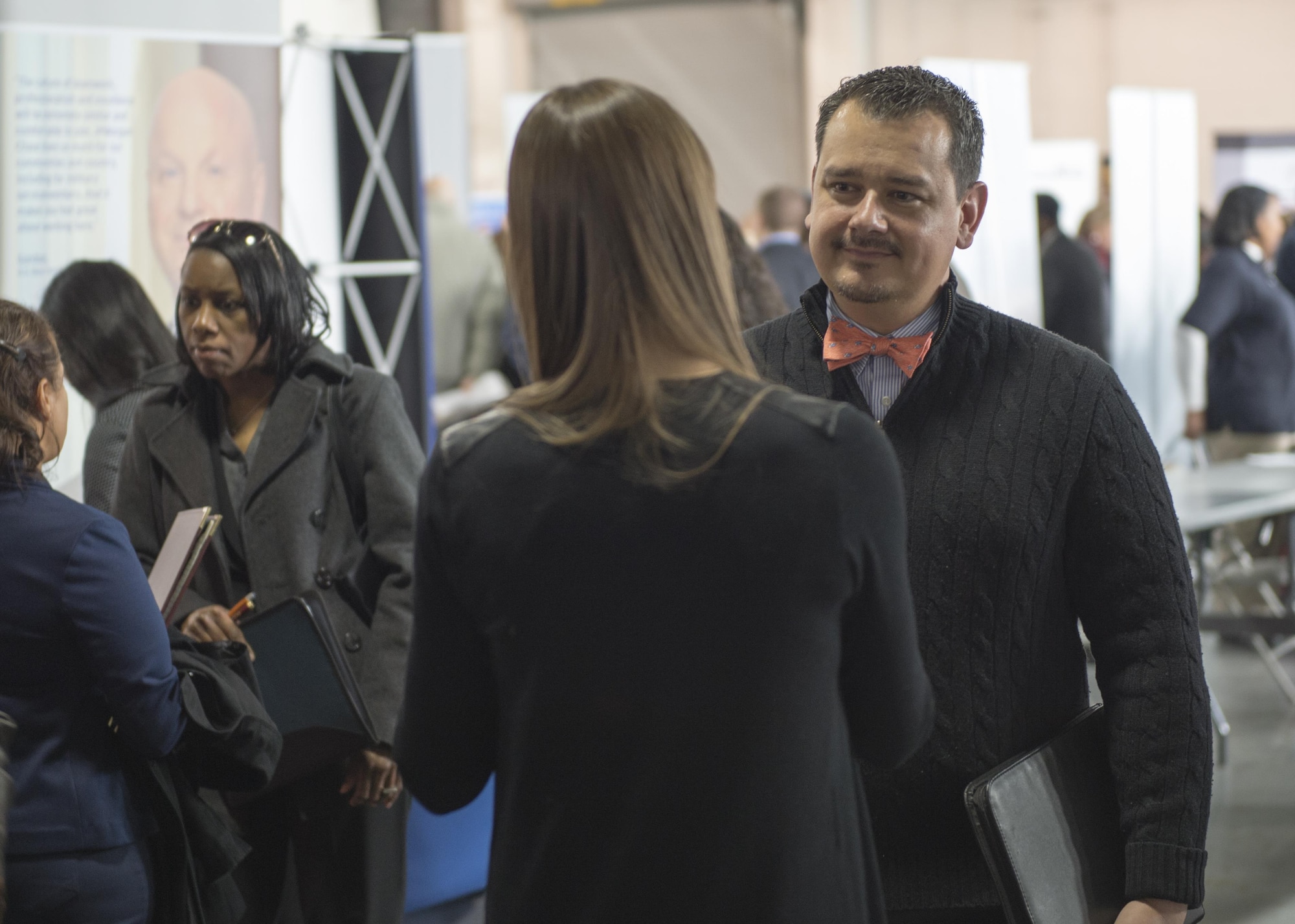 Tech. Sgt. James Harrison, wing inspection planner, 512th Airlift Wing, listens to potential employers during the Transition Summit Hiring Fair, Dover Air Force Base, March 16, 2017. The Transition Summit, sponsored by the U.S. Chamber of Commerce and Hiring our Heroes, offered multiple workshops from resume writing to interview rehearsals in additional to the hiring fair. (U.S. Air Force Photo/Tech. Sgt. Nathan Rivard)