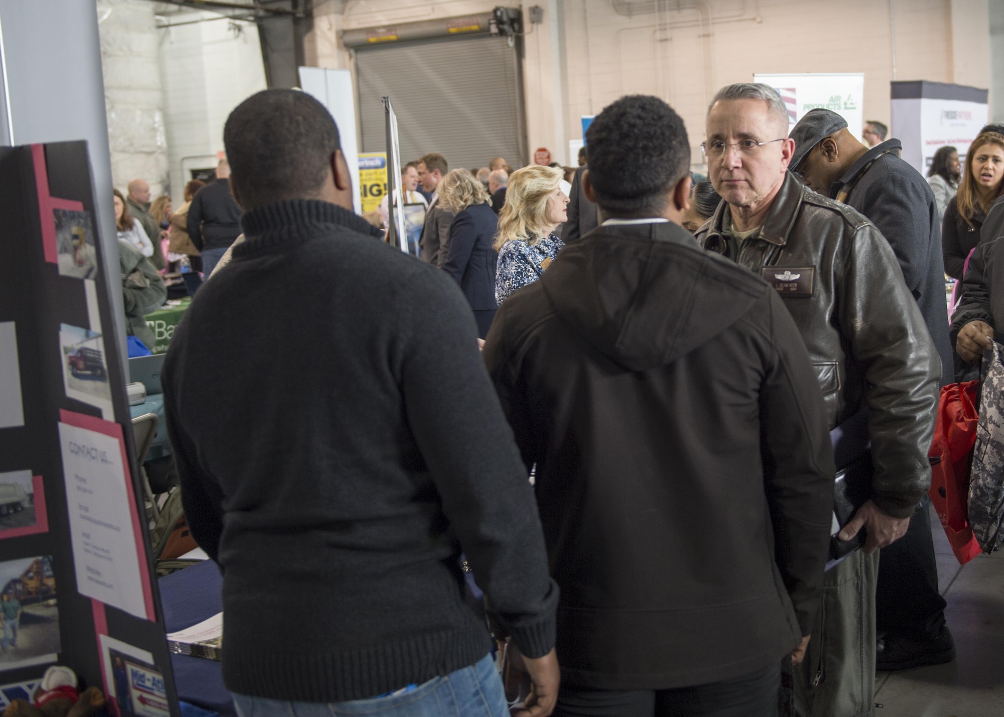 Chief Master Sgt. Larry Reed, C-5M Super Galaxy loadmaster superintendent, 709th Airlift Squadron, listens to potential employers during the Transition Summit Hiring Fair, Dover Air Force Base, March 16, 2017. Reed was preparing for the next step in his career as he looks to transition into retirement from the Air Force. (U.S. Air Force Photo/Tech. Sgt. Nathan Rivard)