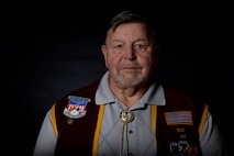 Retired U.S. Air Force Capt. William Robinson, longest surviving enlisted prisoner of war, reflects on his Air Force career before an award ceremony here, March 17, 2017. Robinson was a POW for nearly eight years before being released. Now, Robinson speaks about his experience with community and military members across the country. 