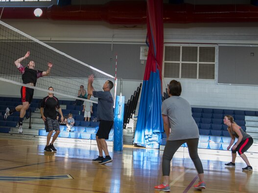 A 96th Medical Group player goes up for a spike during their intramural volleyball game with the 96th Force Support Squadron March 21 at Eglin Air Force Base, Fla.  The MDG dominated winning in two games, 25-12 and 25-14.  (U.S. Air Force photo/Samuel King Jr.)