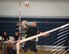 A 96th Medical Group player goes up for a spike during their intramural volleyball game with the 96th Force Support Squadron March 21 at Eglin Air Force Base, Fla.  The MDG destroyed the other team winning in two games, 25-12 and 25-14.  (U.S. Air Force photo/Samuel King Jr.)