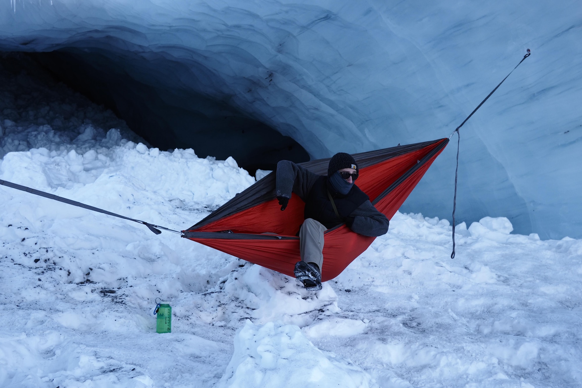 Airman 1st Class Richy Hayes Jr., 673d Air Base Wing Public Affairs broadcast journalist, poses from inside a hammock at Byron Glacier at Girdwood, Alaska, March 12, 2017. 