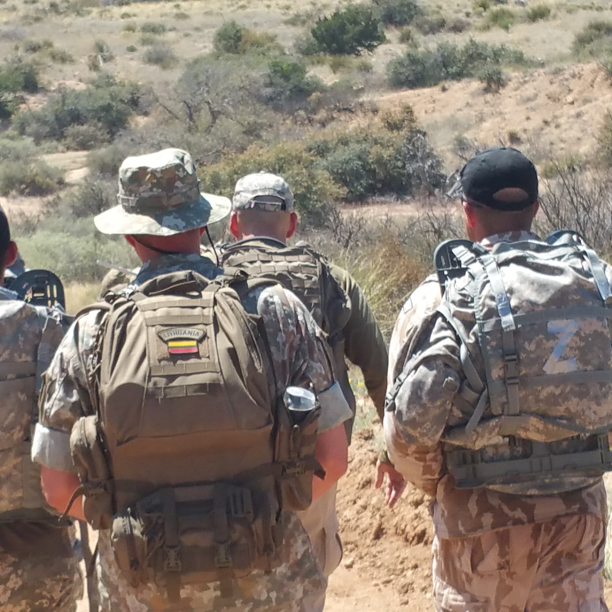 Participants in the Bataan Memorial Death March trek through the desert of White Sands Missile Range, New Mexico, March 19, 2017. The Bataan Memorial Death March commemorates the infamous 65-mile forced march of more than 60,000 American and Filipino troops during World War II. (Courtesy Photo) (U.S. Air National Guard photo by Tech. Sgt. Michael Matkin)