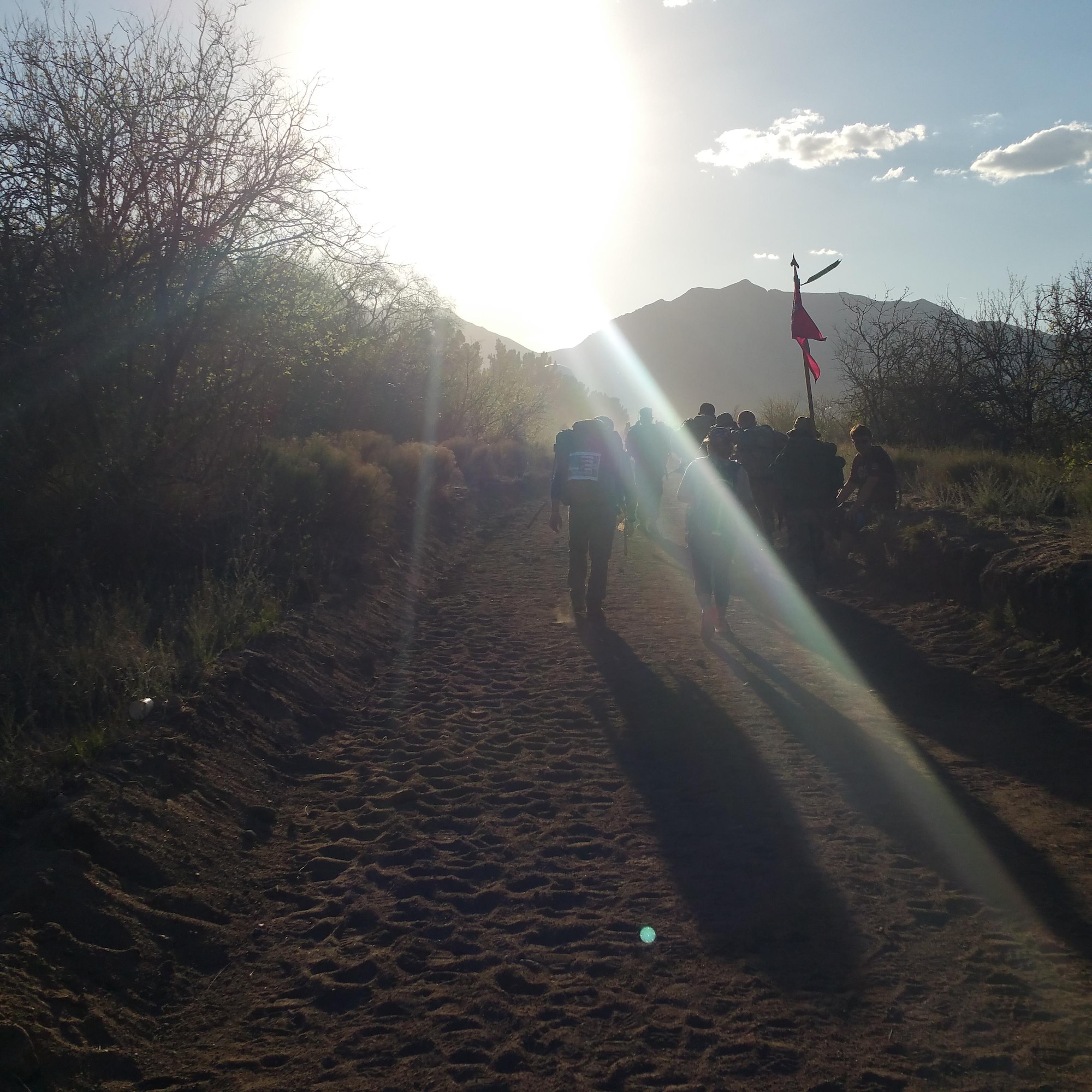 Participants in the Bataan Memorial Death March trek through the desert of White Sands Missile Range, New Mexico, March 19, 2017. The Bataan Memorial Death March commemorates the infamous 65-mile forced march of more than 60,000 American and Filipino troops during World War II. (Courtesy Photo) (U.S. Air National Guard photo by Tech. Sgt. Michael Matkin)