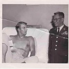 U.S. Army Sgt. Maj. Ricardo Plana visits a soldier in the hospital, November 1970, at Fort Huachuca, Ariz. Retired U.S. Army Sgt. Maj. Ricardo Plana and thousands more prisoners of war were forced to march 70 miles before entering concentration camps during WWII. To honor his and other POW’s sacrifices, Plana’s grandson, U.S. Air Force Staff Sgt. Max Biser, 23d Security Forces Squadron NCO in charge of confinement, marched 26.2 miles, March 19, 2017, at White Sands Missile Range, N.M. (courtesy photo)
