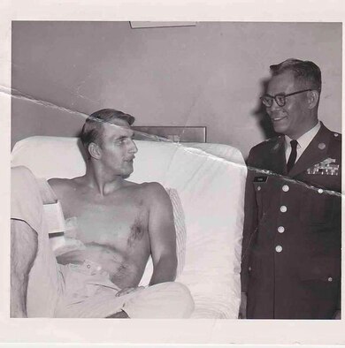 U.S. Army Sgt. Maj. Ricardo Plana visits a soldier in the hospital, November 1970, at Fort Huachuca, Ariz. Retired U.S. Army Sgt. Maj. Ricardo Plana and thousands more prisoners of war were forced to march 70 miles before entering concentration camps during WWII. To honor his and other POW’s sacrifices, Plana’s grandson, U.S. Air Force Staff Sgt. Max Biser, 23d Security Forces Squadron NCO in charge of confinement, marched 26.2 miles, March 19, 2017, at White Sands Missile Range, N.M. (courtesy photo)