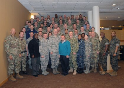 U.S. Air Force Gen. John E. Hyten (fifth from left), commander of U.S. Strategic Command (USSTRATCOM), and U.S. Air Force Chief Master Sgt. Patrick F. McMahon (fourth from left ), senior enlisted leader of USSTRATCOM, meet with Keystone 17-1 participants at the Dougherty Conference Center, Offutt Air Force Base, Neb., March 22, 2017.  The Department of Defense (DoD) Keystone course educates command senior enlisted leaders (CSELs) who are, or will, serve in a general or flag officer-level joint headquarters or service headquarters.  CSELs in the Keystone course visit combatant commands and receive briefings on each commanders’ perspective, missions, roles, responsibilities, and organizational structure.  One of nine DoD unified combatant commands, USSTRATCOM has global strategic missions assigned through the Unified Command Plan that include strategic deterrence; space operations; cyberspace operations; joint electronic warfare; global strike; missile defense; intelligence, surveillance and reconnaissance; and analysis and targeting.