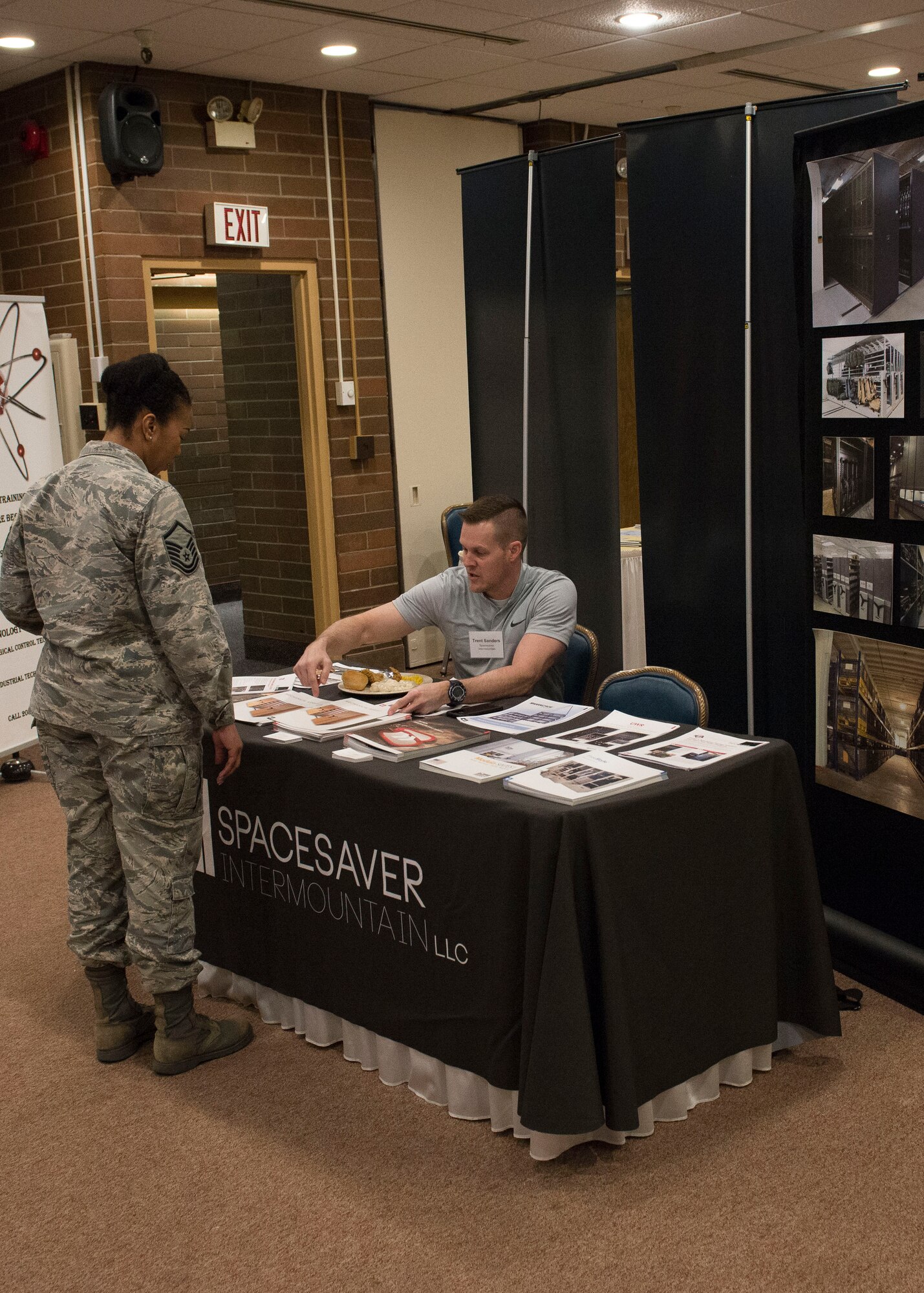 A vendor explains what his business offers at the vendor fair, March 16, 2017, at Mountain Home Air Force Base, Idaho. This annual event gives MHAFB the ability to get to know local businesses and what they’re capable of.(U.S. Air Force photo by Airman Jeremy D. Wolff/Released)
