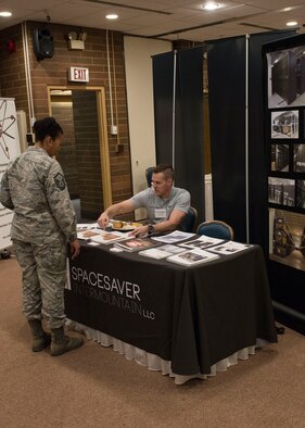 A vendor explains what his business offers at the vendor fair, March 16, 2017, at Mountain Home Air Force Base, Idaho. This annual event gives MHAFB the ability to get to know local businesses and what they’re capable of.(U.S. Air Force photo by Airman Jeremy D. Wolff/Released)
