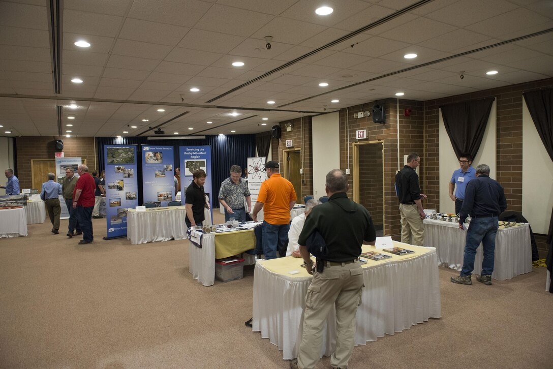 Vendors speak with fellow small business owners about their services at the vendor fair, March 16, 2017, at Mountain Home Air Force Base, Idaho. The fair provides a chance for small businesses to learn more about working with the government and enables networking.(U.S. Air Force photo by Airman Jeremy D. Wolff/Released)