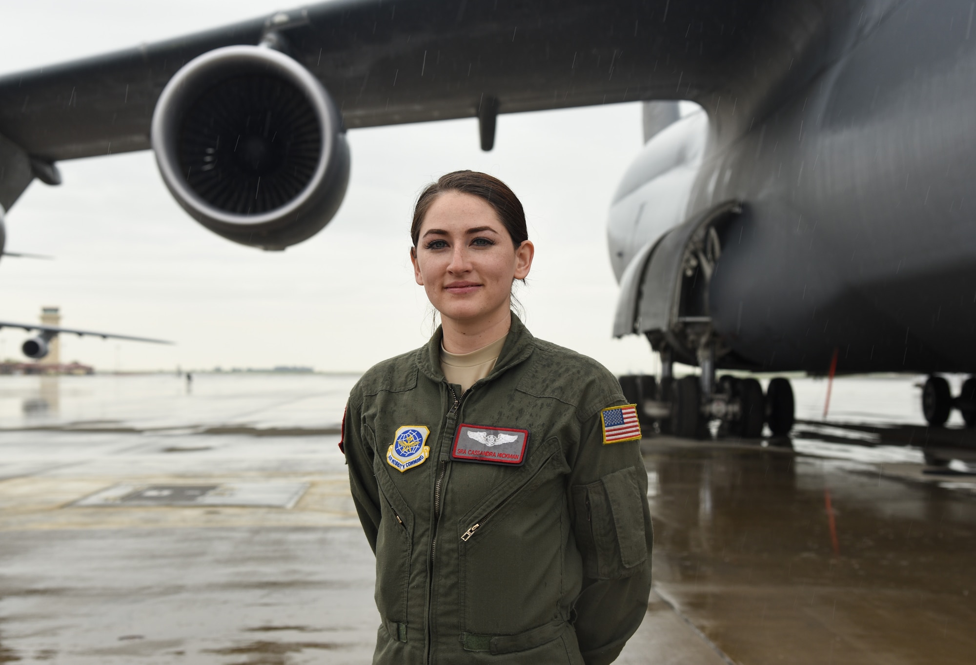 Senior Airman Cassandra Hickman, 22nd Airlift Squadron C-5M Super Galaxy loadmaster, stands in front of a C-5 at Travis Air Force Base, Calif., March 20, 2017. Hickman was the first female in her family to join the military. (U.S. Air Force photo by Senior Airman Sam Salopek)