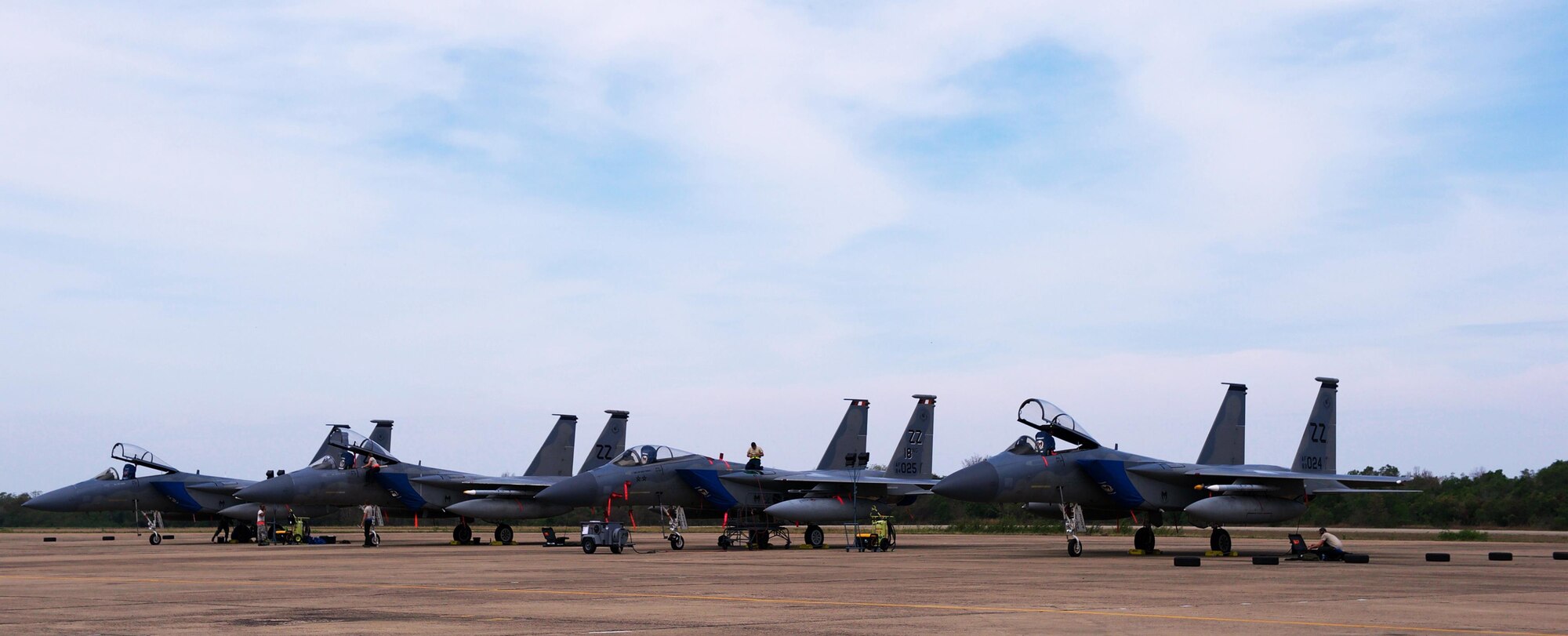 U.S. Airmen with the 18th Wing from Kadena Air Base, Japan prepare F-15 aircraft for missions during exercise Cope Tiger 2017 at Korat Royal Thai Air Force Base, Thailand, March 21, 2017. The annual multilateral exercise, which involves a combined total of 76 aircraft and 43 air defense assets, is aimed at improving combined combat readiness and interoperability between the Republic of Singapore air force, Royal Thai air force, and U.S. Air Force, while concurrently enhancing the three nations' military relations. (U.S. Air Force photo by Staff Sgt. Kamaile Chan)