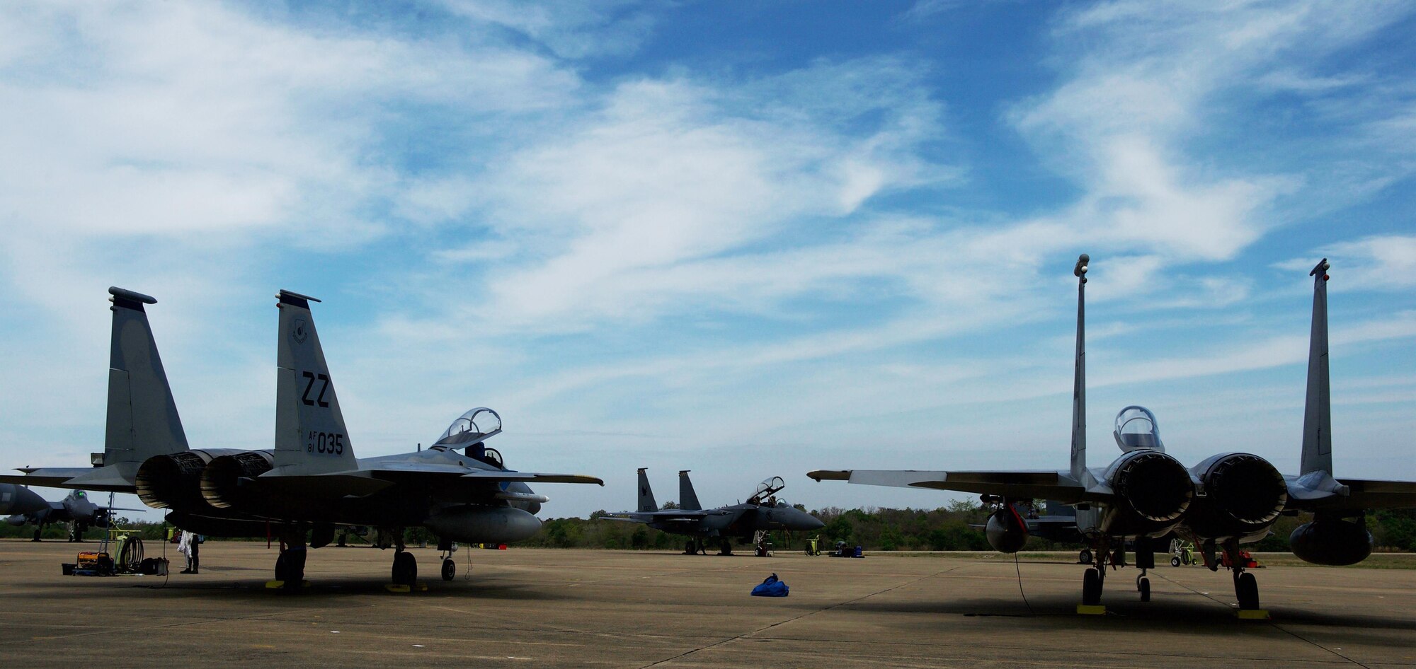 U.S. Air Force F-15 aircraft assigned to the 18th Wing from Kadena Air Base, Japan, sit across from a Republic of Singapore air force F-15 aircraft in preparation for large formation exercises during Cope Tiger 2017 at Korat Royal Thai Air Force Base, Thailand, March 21, 2017. The annual multilateral exercise, which involves a combined total of 76 aircraft and 43 air defense assets, is aimed at improving combined combat readiness and interoperability between the Republic of Singapore air force, Royal Thai air force, and U.S. Air Force, while concurrently enhancing the three nations' military relations. (U.S. Air Force photo by Staff Sgt. Kamaile Chan)