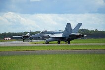 Royal Australian Air Force F-18A Hornets taxi at RAAF Williamtown, during Exercise Diamond Shield 2017 in New South Wales, Australia, March 21, 2017. (U.S. Air Force photo by Tech. Sgt. Steven R. Doty)