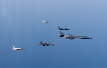 A U.S. Air Force B-1B Lancer flies in formation with Republic of Korea F-15Ks and F-16s in the vicinity of the Republic of Korea March 21, 2017. The sortie was carried out as part of U.S. Pacific Command's continuous bomber presence mission. 

