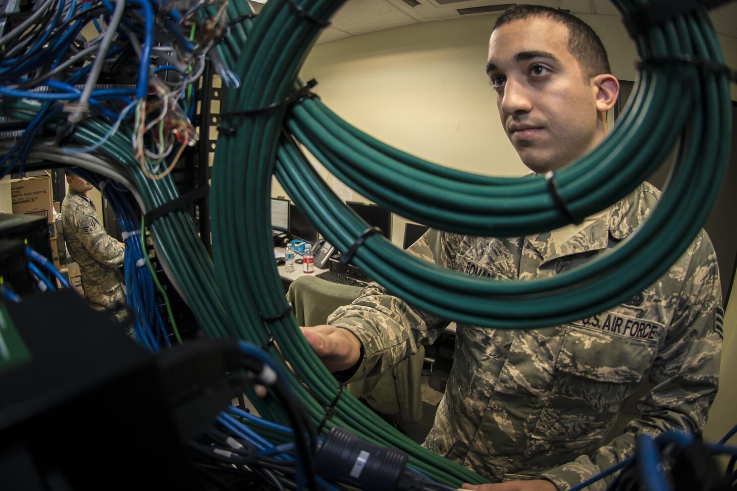 U.S. Air Force Senior Airman Eric Roman, a knowledge management technician with the 747th Communications Squadron at Joint Base Pearl Harbor-Hickam, Hawaii, troubleshoots network issues for the commander’s staff during Key Resolve 2017 at Osan Air Base, ROK, March 22, 2017. From creating launch manuals to storing and disposing of high-level documents, knowledge operations managers care for the flow, distribution, life cycle and disposal of communications and information integral to air, space and cyberspace operations that support the warfighter at home and abroad. (U.S. Air Force photo by Staff Sgt. Benjamin W. Stratton)