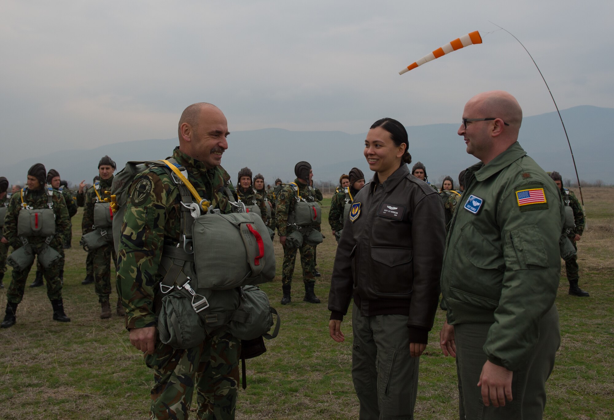 Col. Yordan Yordanov, Republic of Bulgaria Ministry of Defense, deputy director of joint facilities and coordination directorate, left, talks with 37th Airlift Squadron Exercise Thracian Spring mission commanders, Capt. Mary Bordelon and Maj. Scott Hendrix, right, at Plovdiv Regional Airport, Bulgaria, March 15, 2017.  Ramstein Air Base Airmen partnered with the Bulgarian military for the two-week exercise.  The U.S. Air Force’s forward presence in Europe allows Airmen to work with our NATO Allies and partners, to develop ready air forces capable of maintaining regional security.  (U.S. Air Force photo by Staff Sgt. Nesha Humes)