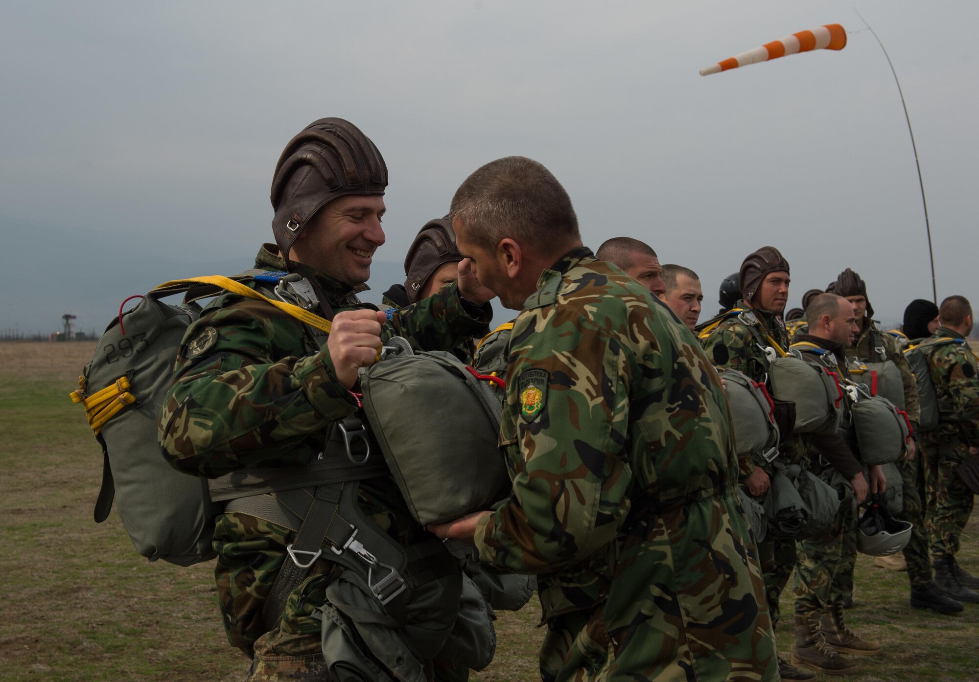 Bulgarian paratroopers inspect gear during Exercise Thracian Spring 17 at Plovdiv Regional Airport, Bulgaria, March 15, 2017. More than 60 U.S. Air Force Airmen from Ramstein Air Base, Germany, participated in combined air operations with Bulgarian military to strengthen relationships while building their nations’ joint military capabilities. The U.S. shares a commitment with Bulgaria, a NATO ally, to promote peace and close cooperation on countering a range of regional and global threats. (U.S. Air Force photo by Staff Sgt. Nesha Humes)