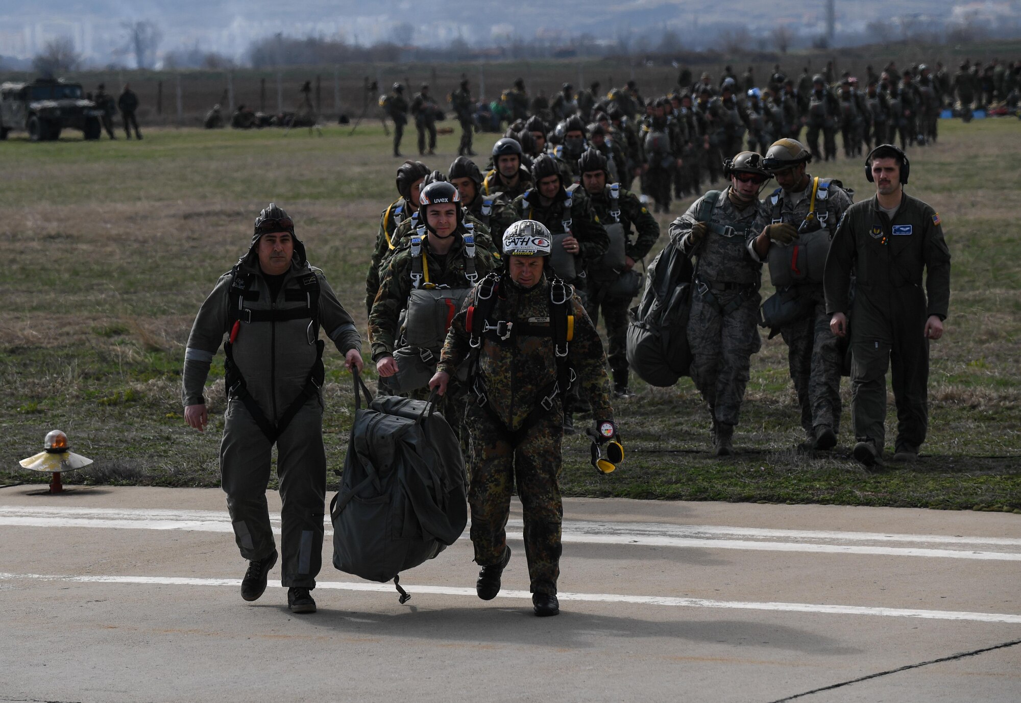 Exercise Thracian Spring 17 personnel load a C-130J Super Hercules in preparation for a personnel drop during Exercise Thracian Spring 17 at Plovdiv Regional Airport, Bulgaria, March 20, 2017. Airmen from the 37th Airlift Squadron, 435th Contingency Response Group, and 86th Airlift Wing, Ramstein Air Base, Germany, partnered with the Bulgarian military for the two-week exercise. The U.S. shares a commitment with Bulgaria, a NATO ally, to promote peace and close cooperation on countering a range of regional and global threats. (U.S. Air Force photo by Staff Sgt. Nesha Humes)