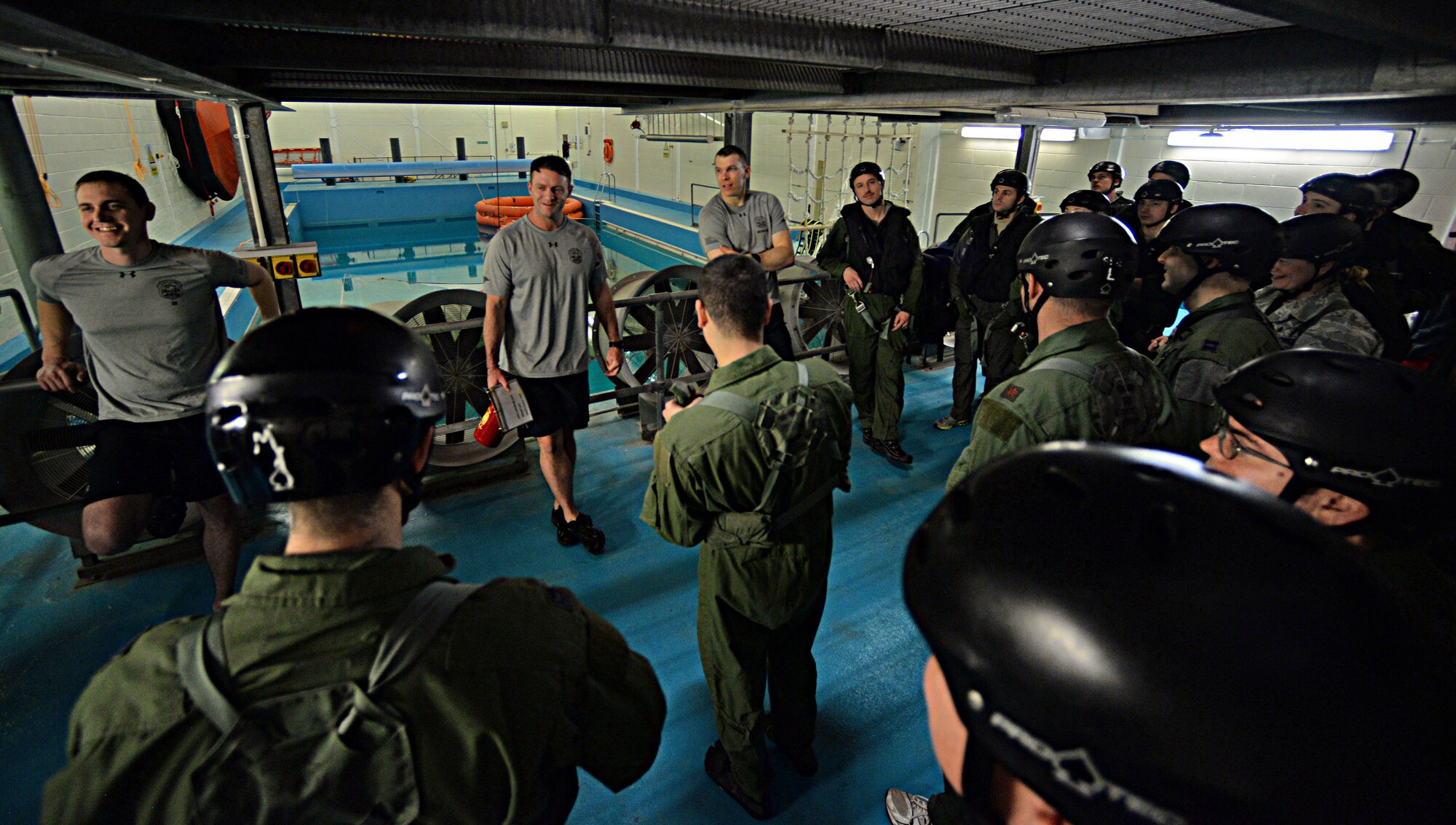 U.S. Air Force instructors and students gather for an initial briefing before conducting training March 10, 2017, at Lowestoft College, Maritime and Offshore Facilities, England. Airmen from the 100th Air Refueling Wing, and 352nd Special Operations Wing from RAF Mildnehall, England, and 48th Fighter Wing from RAF Lakenheath, England, receive refresher training every three years, which consists of hand-to-hand combatives, combat survival training and water survival training. (U.S. Air Force photo by Senior Airman Christine Halan)