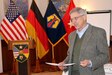 Retired Ambassador David Litt, the executive director for the Institute for Defense and Business Center for Stabilization and Economic Reconstruction speaks to 7th Mission Support Command personnel during the Diplomacy at Work Professional Development Workshop March 22 at the Armstrong Club on Vogelweh Air Force Base. 