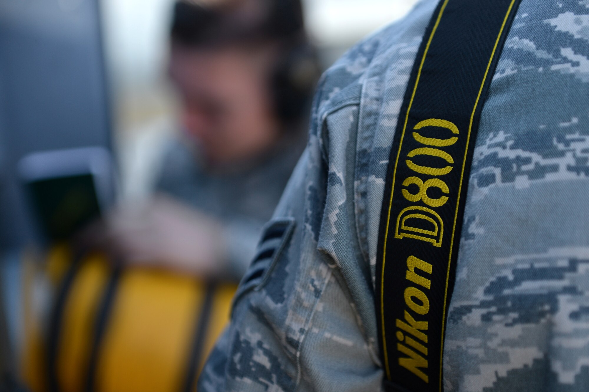 U.S. Air Force Senior Airman Kelsey Tucker, 20th Fighter Wing (FW) Public Affairs (PA) photojournalist journeyman, gets captioning information from a photo subject at Shaw Air Force Base, S.C., March 21, 2017. Photojournalists assigned to the 20th FW PA office capture photos of installation operations, showcasing Team Shaw’s Airmen while highlighting the wing’s core mission of suppression of enemy air defense. (U.S. Air Force photo by Airman 1st Class Christopher Maldonado)